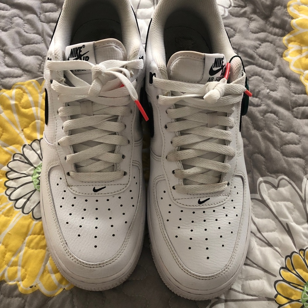 Nike Cream/White Leather Low-Top Sneaker with Black Swoosh Accent